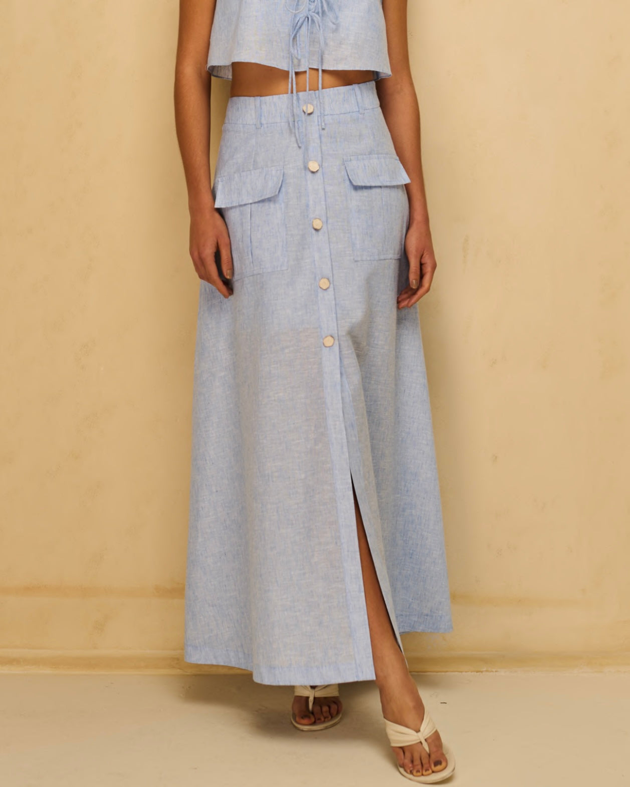 Saia Com botão em pedra